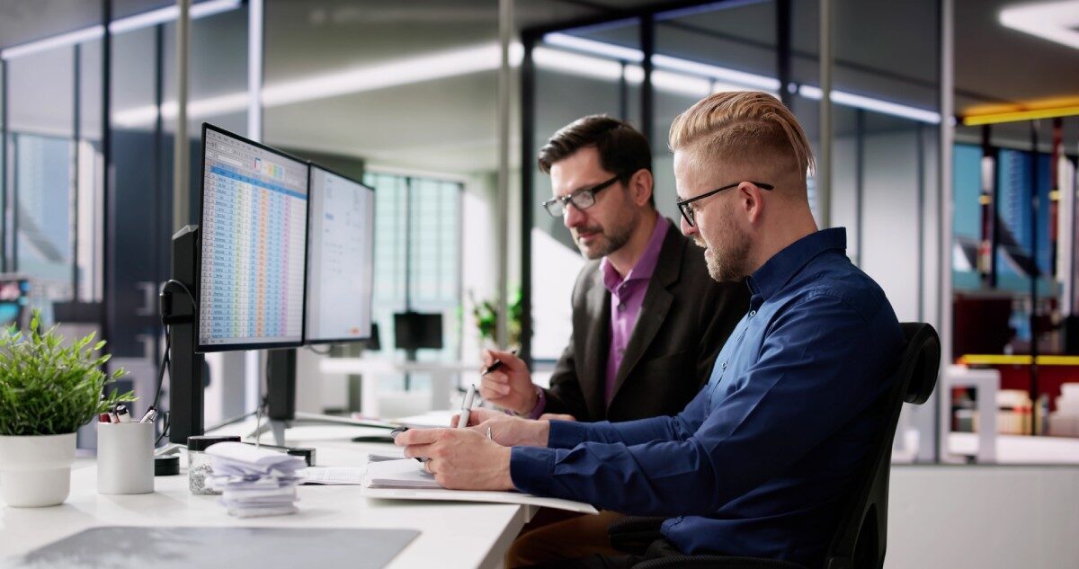 usingcorporateinvoicespreadsheetoncomputermonitors